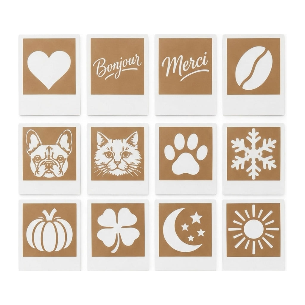 Les 12 cartes pochoirs incluses : cœur, Bonjour, Merci, grain de café, bouledogue, chat, patte, flocon, citrouille, trèfle, lune, soleil