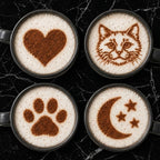 Quatre cafés décorés : cœur, chat, patte et lune